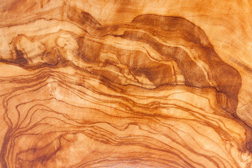 Close-up of the natural grain of olive wood